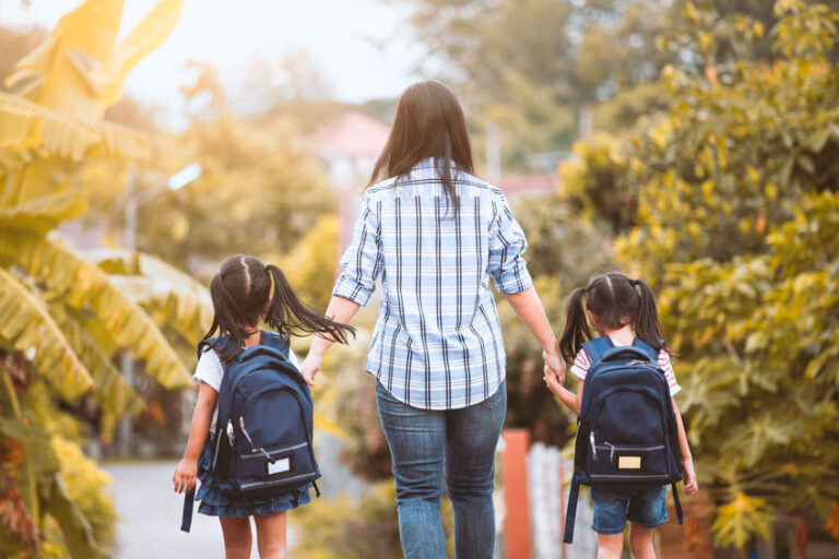 Mother and school children