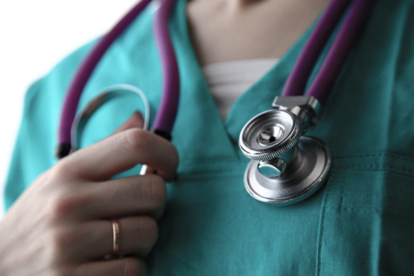 Nurse holding stethoscope 