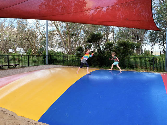 Kids on bouncy pillow - NRMA Ocean Beach Resort