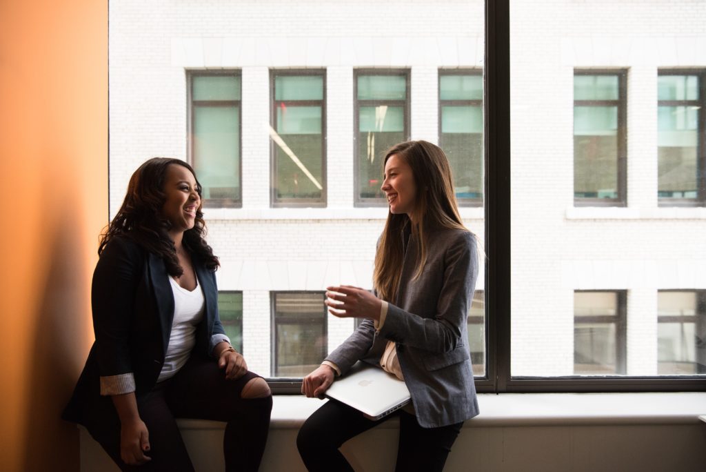 Two women in informal meeting